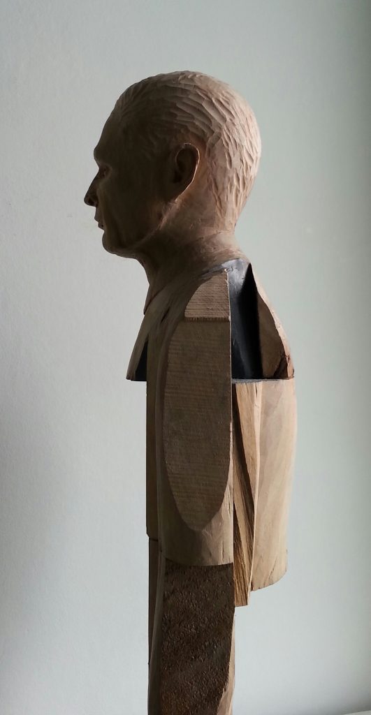 Smoking Man. Lime wood carving with paper and graphite by Lee Devonish, 2015