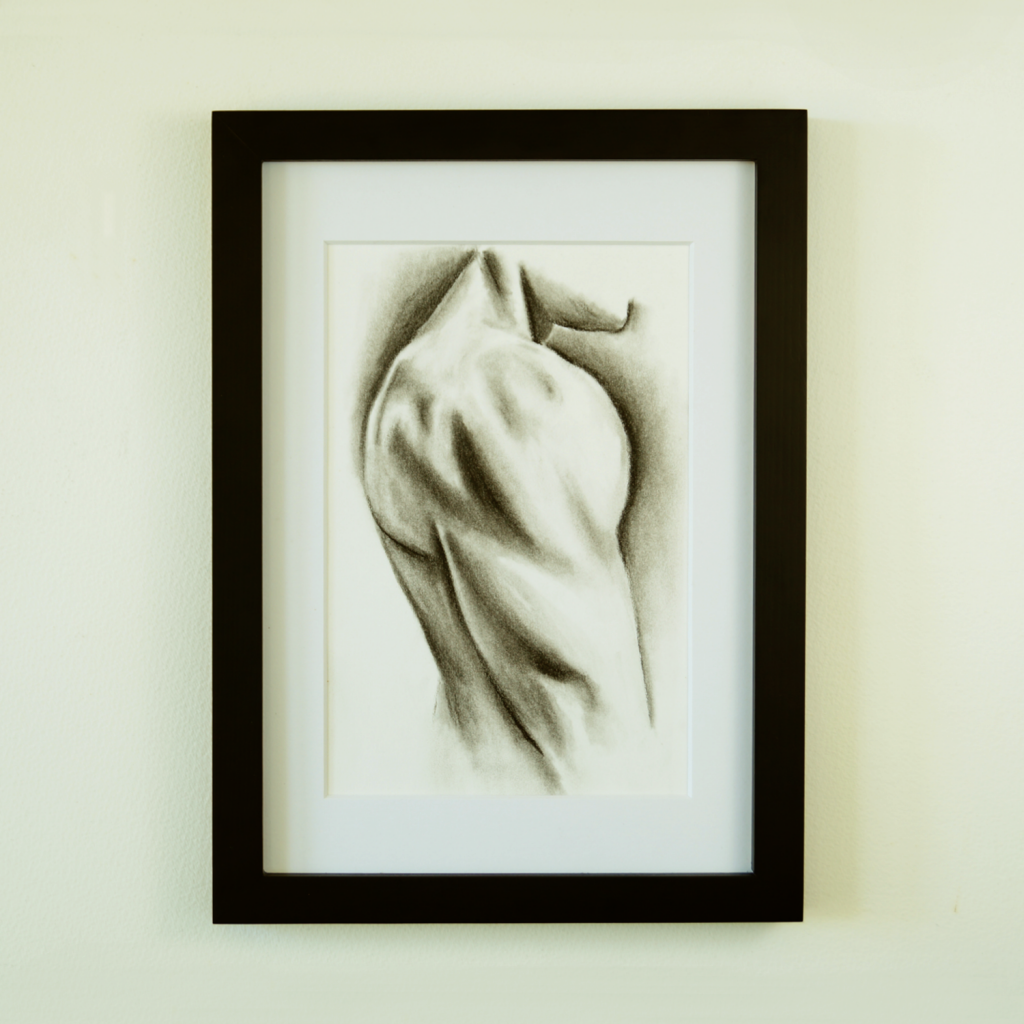 Charcoal drawing of a man's deltoid