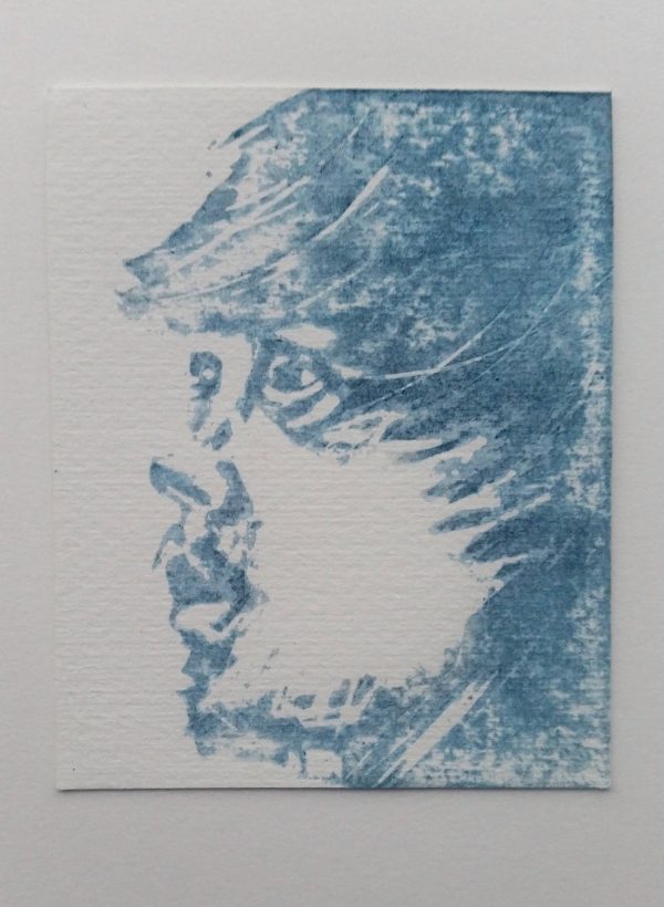 Wild Man (white) 2/10. Blue and white woodcut print of a man's 3/4 profile