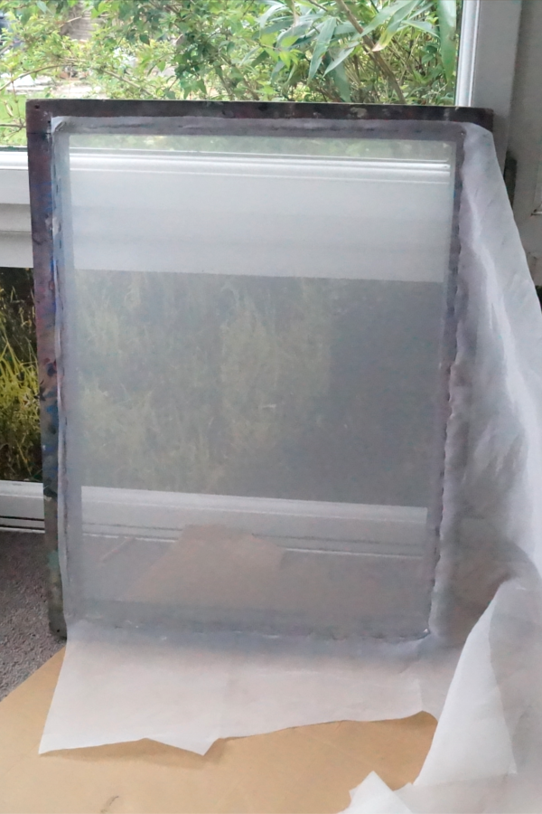 Stretching an aluminium screen with a wooden screen