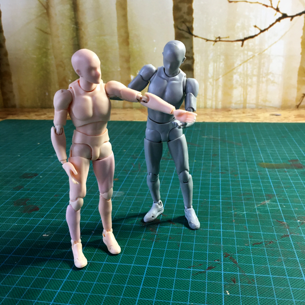 Inspecting a knock-off Body Kun figure bought for kitbashing.