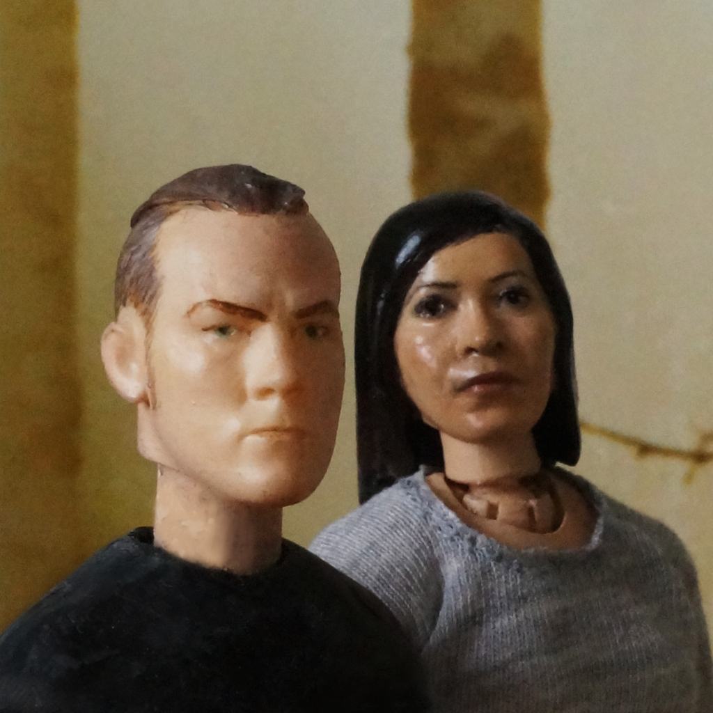 Two stop motion figures with 3D printed face sculpts.